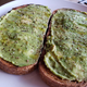 A rustic wheat bread, mashed avocado, olive oil, salt and pepper aka breakfast masterpiece